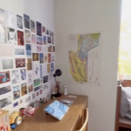 Desk set up inside a college dorm.